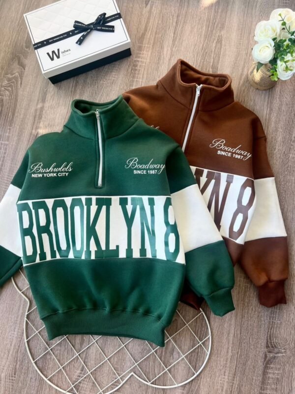 WhatsApp Image 2026-03-28 at 1.25.41 PM MAXI BUZO BROOKLING MEDIO CIERRE FRISADO